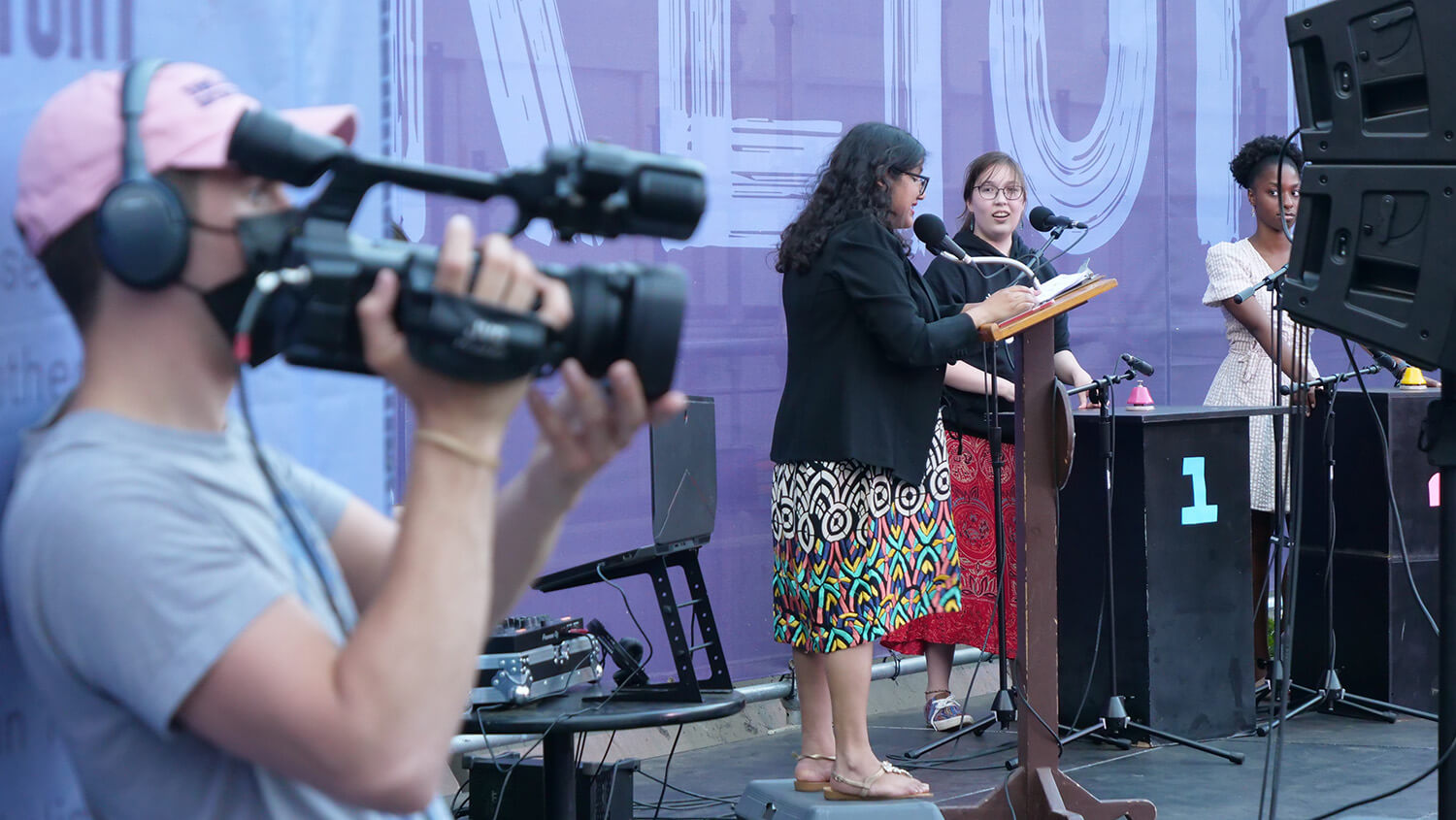 Production services shows a film crew working at a live outdoor event